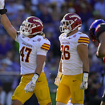 Nov 8, 2025; Fort Worth, Texas, USA; Iowa State Cyclones linebacker Kooper Ebel (47) and linebacker Caleb Bacon (26) celebrates a defensive stop against the TCU Horned Frogs during the first half at Amon G. Carter Stadium. Mandatory Credit: Jerome Miron-Imagn Images