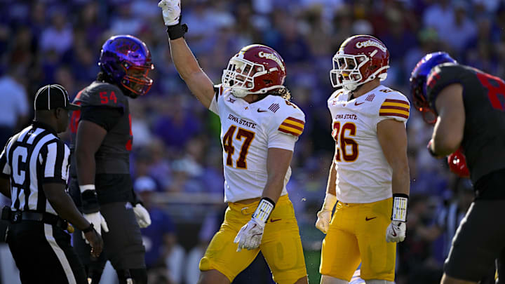 Nov 8, 2025; Fort Worth, Texas, USA; Iowa State Cyclones linebacker Kooper Ebel (47) and linebacker Caleb Bacon (26) celebrates a defensive stop against the TCU Horned Frogs during the first half at Amon G. Carter Stadium. Mandatory Credit: Jerome Miron-Imagn Images