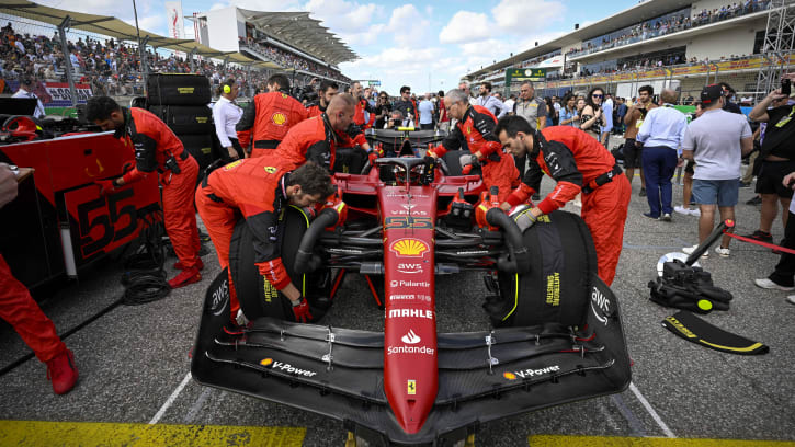 Oct 23, 2022; Austin, Texas, USA; The crew of Scuderia Ferrari driver Carlos Sainz (55) of Team