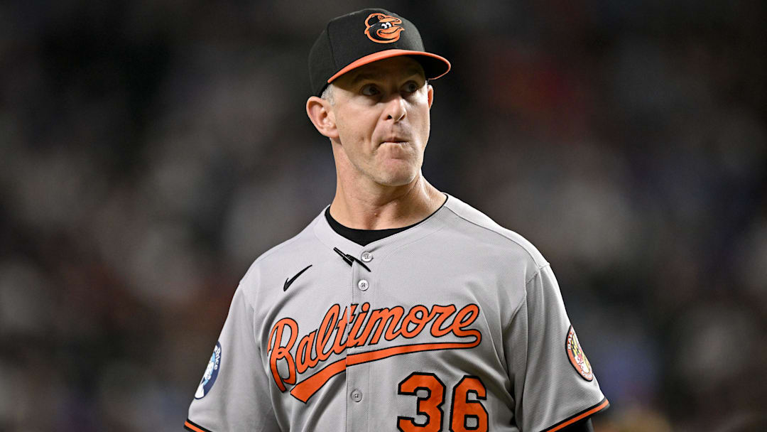 Jul 2, 2025; Arlington, Texas, USA; Baltimore Orioles interim manager Tony Mansolino (36) walks back to the dugout during the fifth inning against the Texas Rangers at Globe Life Field. Jul 2, 2025; Arlington, Texas, USA; Baltimore Orioles interim manager Tony Mansolino (36) walks back to the dugout during the fifth inning against the Texas Rangers at Globe Life Field.
