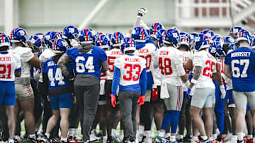 New York Giants huddle during minicamp at Quest Diagnostics Training Center.  