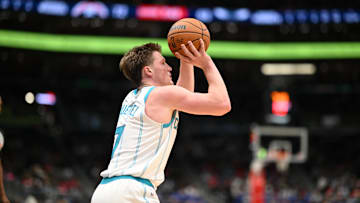 Oct 26, 2025; Washington, District of Columbia, USA; Charlotte Hornets guard Kon Knueppel (7) attempts.a shot against the Washington Wizards during the third quarter at Capital One Arena. Mandatory Credit: Rafael Suanes-Imagn Images