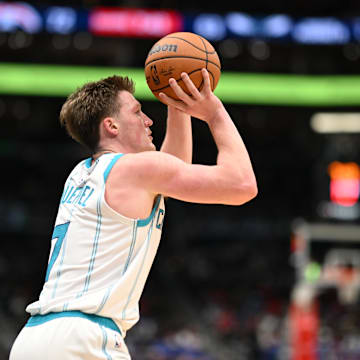 Oct 26, 2025; Washington, District of Columbia, USA; Charlotte Hornets guard Kon Knueppel (7) attempts.a shot against the Washington Wizards during the third quarter at Capital One Arena. Mandatory Credit: Rafael Suanes-Imagn Images