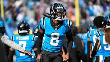 Oct 26, 2025; Charlotte, North Carolina, USA; Carolina Panthers cornerback Jaycee Horn (8) runs on to the field before the game at Bank of America Stadium. Mandatory Credit: Bob Donnan-Imagn Images