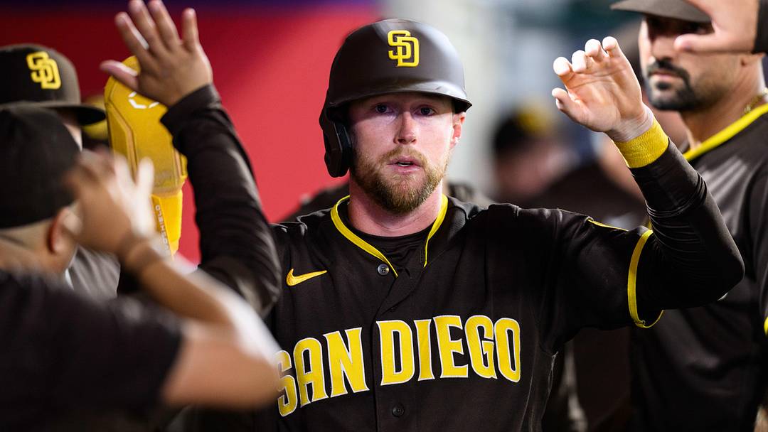 Apr 18, 2026; Anaheim, California, USA; San Diego Padres second baseman Jake Cronenworth (9) is greeted by teammates after scoring during the eighth inning against the Los Angeles Angels at Angel Stadium. Mandatory Credit: William Liang-Imagn Images Apr 18, 2026; Anaheim, California, USA; San Diego Padres second baseman Jake Cronenworth (9) is greeted by teammates after scoring during the eighth inning against the Los Angeles Angels at Angel Stadium. Mandatory Credit: William Liang-Imagn Images