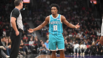 Nov 17, 2025; Toronto, Ontario, CAN;  Charlotte Hornets guard Collin Sexton (8) debates a call with a game official in the second half against the Toronto Raptors at Scotiabank Arena. Mandatory Credit: Dan Hamilton-Imagn Images