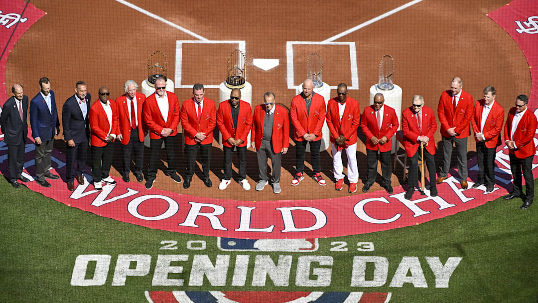 Mar 30, 2023; St. Louis, Missouri, USA; St. Louis Cardinals red jacket hall of famers pose for a photo in front of World Series trophies before an opening day game against the Toronto Blue Jays at Busch Stadium. Mandatory Credit: Jeff Curry-Imagn Images Mar 30, 2023; St. Louis, Missouri, USA; St. Louis Cardinals red jacket hall of famers pose for a photo in front of World Series trophies before an opening day game against the Toronto Blue Jays at Busch Stadium. Mandatory Credit: Jeff Curry-Imagn Images