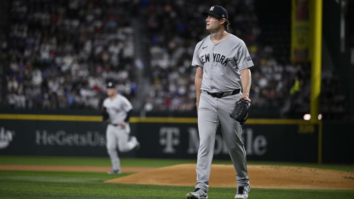 Sep 2, 2024; Arlington, Texas, USA; New York Yankees starting pitcher Gerrit Cole (45) walks off the field after he pitches against the Texas Rangers during the first inning at Globe Life Field. Mandatory Credit: Jerome Miron-USA TODAY Sports