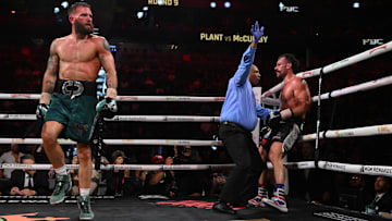 Caleb Plant (left) after stopping Trevor McCumby (right) in the 8th round.