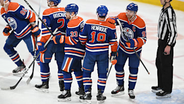 Apr 11, 2025; Edmonton, Alberta, CAN; Edmonton Oilers right winger Corey Perry (90), defenseman Evan Bouchard (2), left winger Viktor Arvidsson (33), centre Adam Henrique (19), and centre Connor McDavid celebrate a goal on the San Jose Sharks during the third period at Rogers Place. Mandatory Credit: Walter Tychnowicz-Imagn Images