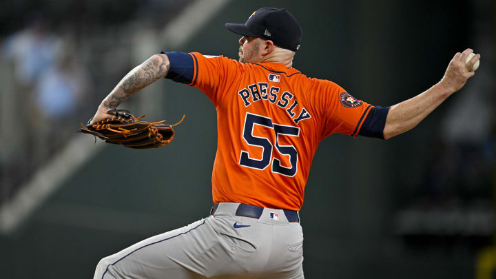 Aug 7, 2024; Arlington, Texas, USA; Houston Astros relief pitcher Ryan Pressly (55) in action during the game between the Texas Rangers and the Houston Astros at Globe Life Field