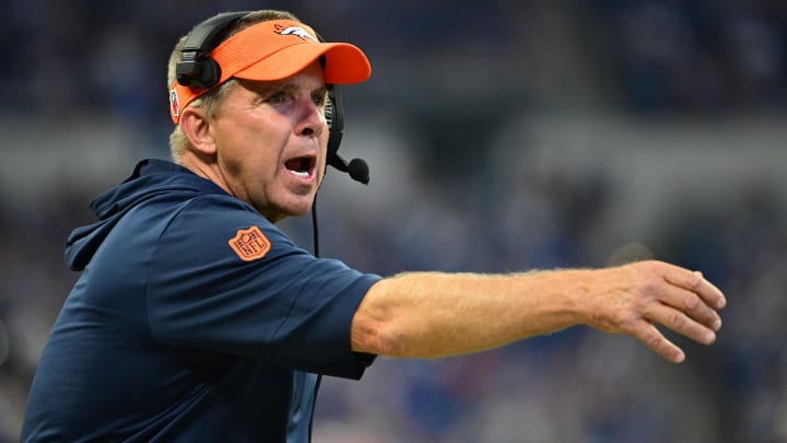 Aug 11, 2024; Indianapolis, Indiana, USA;  Denver Broncos Head Coach Sean Payton throws a challenge flag during the second half against the Indianapolis Colts at Lucas Oil Stadium. 