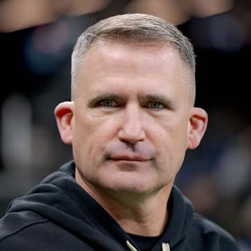 Dec 1, 2024; New Orleans, Louisiana, USA; New Orleans Saints interim head coach Darren Rizzi walks the sideline before a game against the Los Angeles Rams at Caesars Superdome. Mandatory Credit: Matthew Hinton-Imagn Images