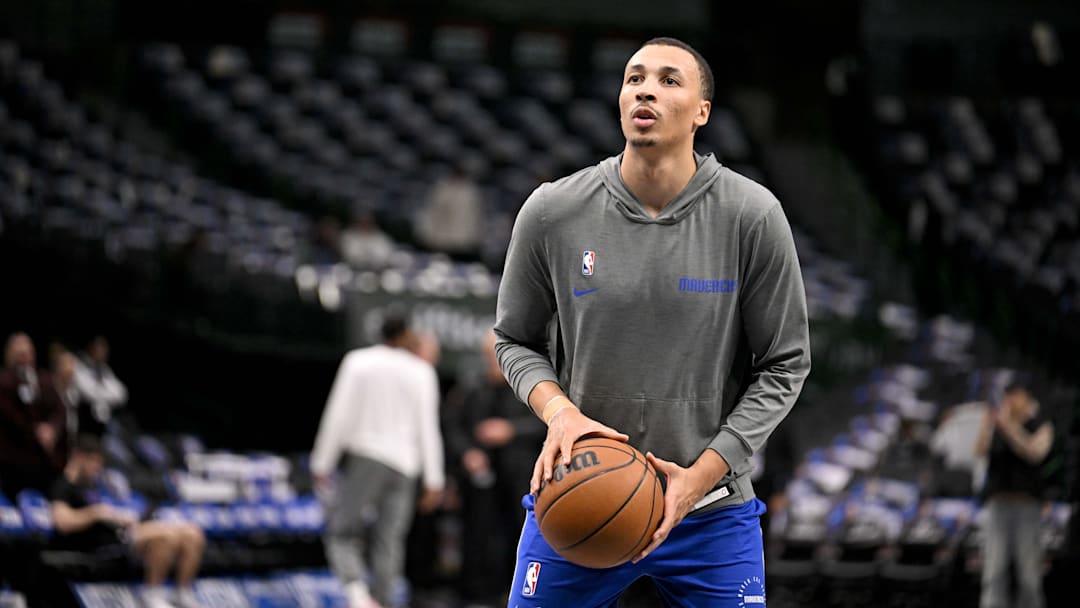Feb 10, 2025; Dallas, Texas, USA; Dallas Mavericks guard Dante Exum (0) warms up before the game against the Sacramento Kings during the first quarter at the American Airlines Center. Mandatory Credit: Jerome Miron-Imagn Images