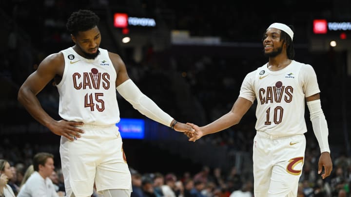 Oct 12, 2022; Cleveland, Ohio, USA; Cleveland Cavaliers guard Donovan Mitchell (45) and guard Darius Garland (10) shake hands after a play during the second half against the Atlanta Hawks at Rocket Mortgage FieldHouse. Mandatory Credit: Ken Blaze-USA TODAY Sports