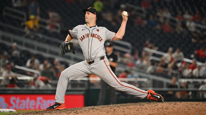 Aug 5, 2024; Washington, District of Columbia, USA; San Francisco Giants relief pitcher Taylor Rogers (33) throws a pitch against the Washington Nationals during the eighth inning at Nationals Park. Mandatory Credit: Rafael Suanes-USA TODAY Sports