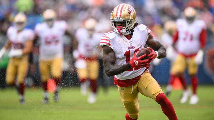 Sep 11, 2022; Chicago, Illinois, USA; San Francisco 49ers wide receiver Brandon Aiyuk (11) runs after a catch in the first quarter against the Chicago Bears at Soldier Field. Mandatory Credit: Daniel Bartel-USA TODAY Sports