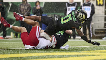 Oct 25, 2025; Eugene, Oregon, USA; Oregon Ducks running back Jordon Davison (0) scores a touchdown during the first half against the Wisconsin Badgers at Autzen Stadium. Mandatory Credit: Troy Wayrynen-Imagn Images