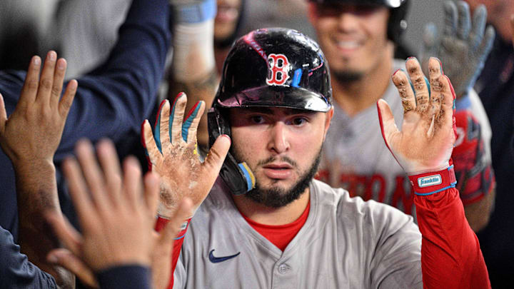 Sep 24, 2024; Toronto, Ontario, CAN; Boston Red Sox right fielder Wilyer Abreu (52) celebrates with teammates in the dugout after scoring a run against the Toronto Blue Jays in the seventh inning at Rogers Centre. Mandatory Credit: Dan Hamilton-Imagn Images