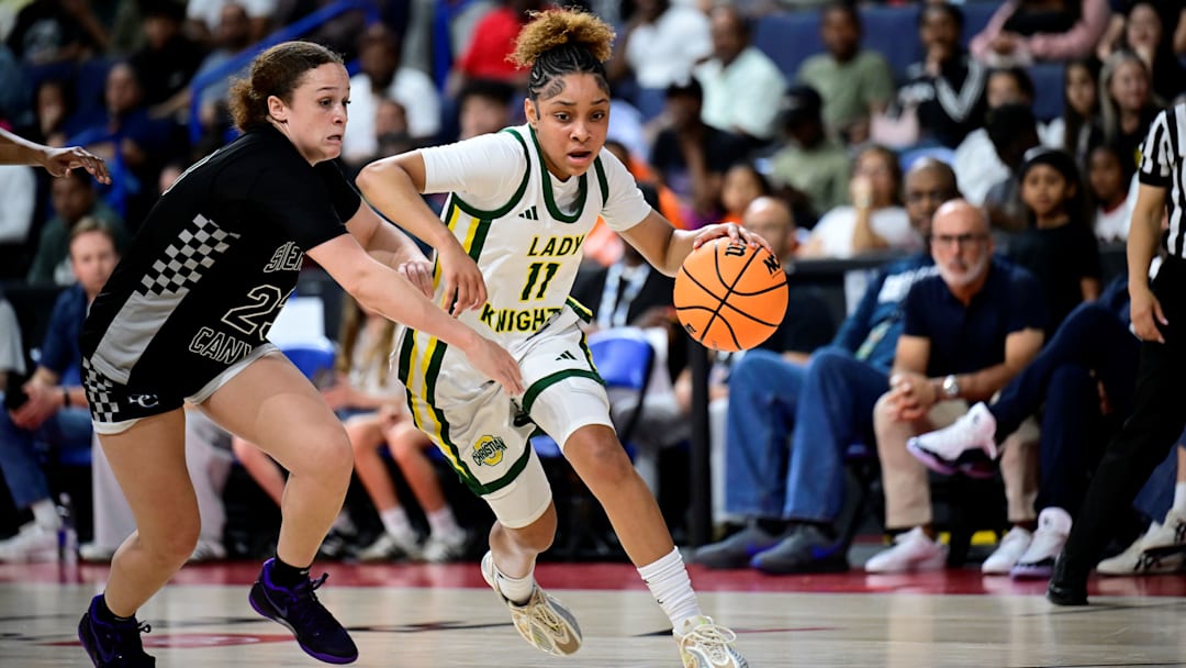 Ontario Christian's Kaleena Smith drives to the hoop against a Sierra Canyon defender in the CIF Southern Section Open Division final on Feb. 28, 2026. Ontario Christian's Kaleena Smith drives to the hoop against a Sierra Canyon defender in the CIF Southern Section Open Division final on Feb. 28, 2026.