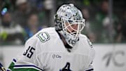 Jan 31, 2025; Dallas, Texas, USA; Vancouver Canucks goaltender Thatcher Demko (35) faces the Dallas Stars attack during the second period at the American Airlines Center. Mandatory Credit: Jerome Miron-Imagn Images