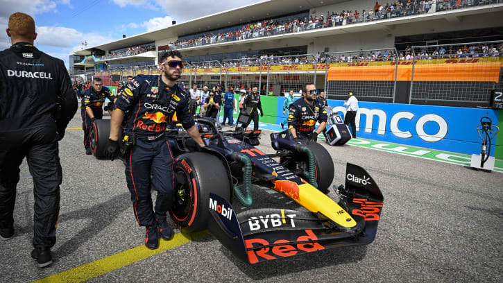 Oct 23, 2022; Austin, Texas, USA; The crew of Red Bull Racing Limited driver Sergio Perez (11) of