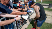 Feb 15, 2025; Lee County, FL, USA; Boston Red Sox center fielder Jarren Duran (16) signs autographs for fans  during Spring Training at Jet Blue Park at Fenway South. 
