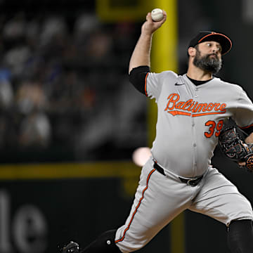Jul 2, 2025; Arlington, Texas, USA; Baltimore Orioles relief pitcher Andrew Kittredge (39) pitches during the game between the Texas Rangers and the Baltimore Orioles at Globe Life Field. Mandatory Credit: Jerome Miron-Imagn Images