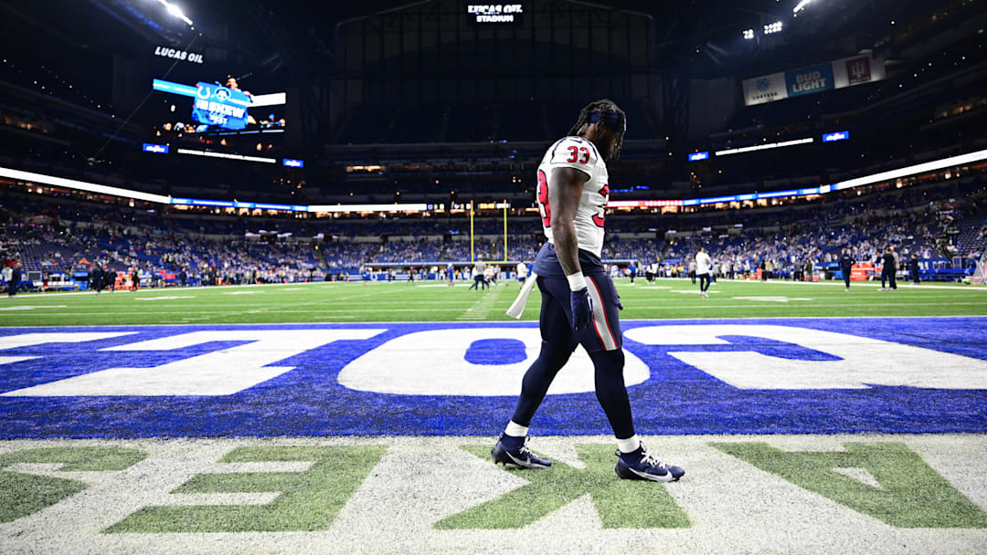 Jan 6, 2024; Indianapolis, Indiana, USA; Houston Texans running back Dare Ogunbowale (33) walks on the field before a game against the Indianapolis Colts at Lucas Oil Stadium.