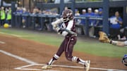 May 10, 2024; Auburn, AL, USA;  Texas A&M Aggies infielder Koko Wooley (3) bats against the Florida Gators at Jane B. Moore Field. Mandatory Credit: Julie Bennett-Imagn Images