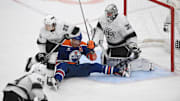 Apr 14, 2025; Edmonton, Alberta, CAN; Edmonton Oilers (90) in front of Los Angeles Kings goalie David Rittich (31) during the third period at Rogers Place. Mandatory Credit: Walter Tychnowicz-Imagn Images