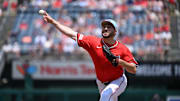Jul 4, 2025; Washington, District of Columbia, USA; Washington Nationals relief pitcher Ryan Loutos (52) throws a pitch against the Boston Red Sox during the seventh inning at Nationals Park. Mandatory Credit: Rafael Suanes-Imagn Images