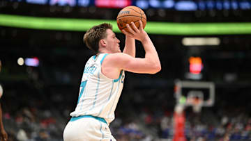 Oct 26, 2025; Washington, District of Columbia, USA; Charlotte Hornets guard Kon Knueppel (7) attempts.a shot against the Washington Wizards during the third quarter at Capital One Arena. Mandatory Credit: Rafael Suanes-Imagn Images