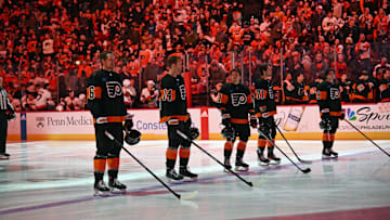 Jan 21, 2024; Philadelphia, Pennsylvania, USA; Philadelphia Flyers defenseman Travis Sanheim (6),  center Sean Couturier (14), right wing Travis Konecny (11), right wing Tyson Foerster (71) and defenseman Jamie Drysdale (9) line up during national anthem against the Ottawa Senators at Wells Fargo Center.