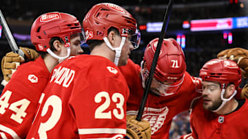 Nov 16, 2025; New York, New York, USA; Detroit Red Wings right wing Alex Debrincat (93) celebrates with teammates after scoring a goal against the New York Rangers during the second period at Madison Square Garden. Mandatory Credit: John Jones-Imagn Images