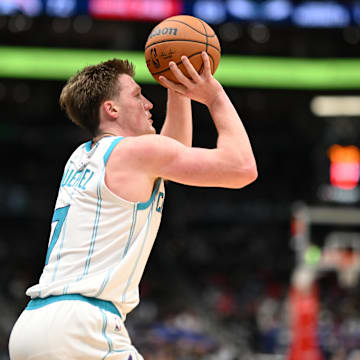 Oct 26, 2025; Washington, District of Columbia, USA; Charlotte Hornets guard Kon Knueppel (7) attempts.a shot against the Washington Wizards during the third quarter at Capital One Arena. Mandatory Credit: Rafael Suanes-Imagn Images