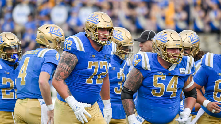 Nov 30, 2024; Pasadena, California, USA; UCLA Bruins offensive linemen Garrett DiGiorgio (72) and Josh Carlin (54) during the second quarter against the Fresno State Bulldogs at Rose Bowl. Mandatory Credit: Robert Hanashiro-Imagn Images Nov 30, 2024; Pasadena, California, USA; UCLA Bruins offensive linemen Garrett DiGiorgio (72) and Josh Carlin (54) during the second quarter against the Fresno State Bulldogs at Rose Bowl. Mandatory Credit: Robert Hanashiro-Imagn Images