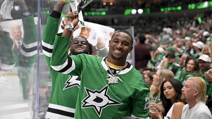 Dallas Cowboys rookie Donovan Ezeiruaku poses for a photo during the first period between the Dallas Stars and Edmonton Oilers. Dallas Cowboys rookie Donovan Ezeiruaku poses for a photo during the first period between the Dallas Stars and Edmonton Oilers.
