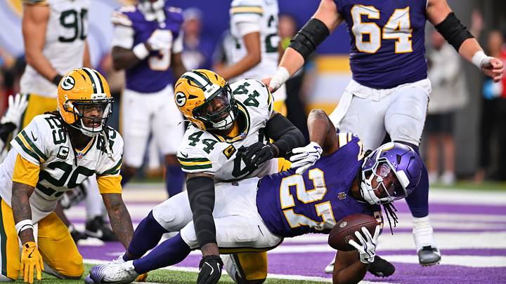 Sep 13, 2026; Minneapolis, Minnesota, USA;  Minnesota Vikings running back Jordan Mason (27) is tackled by Green Bay Packers linebacker Zaire Franklin (44) during the second half at U.S. Bank Stadium.  Mandatory Credit: Jeffrey Becker-Imagn Images