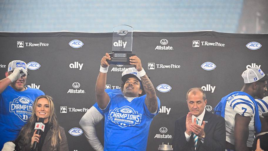 Duke Blue Devils quarterback Darian Mensah celebrates defeating the Virginia Cavaliers during the 2025 ACC championship.