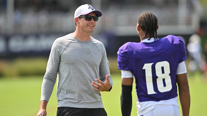 Aug 3, 2024; Eagan, MN, USA; Minnesota Vikings head coach Kevin O'Connell talks with wide receiver Justin Jefferson (18) during practice at Vikings training camp in Eagan, MN.