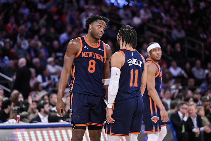 New York Knicks forward OG Anunoby and guard Jalen Brunson chat during a break in the action against the Boston Celtics.