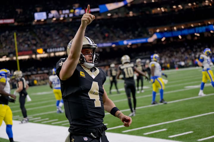 New Orleans Saints quarterback Derek Carr reacts after rushing for a first down against the Los Angeles Rams.
