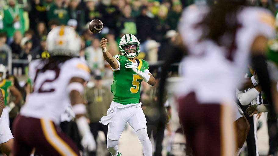 Oregon quarterback Dante Moore throws the ball.