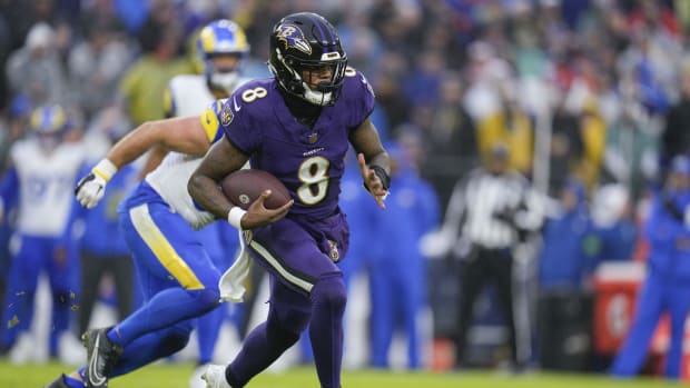 Baltimore Ravens quarterback Lamar Jackson runs against the Los Angeles Rams