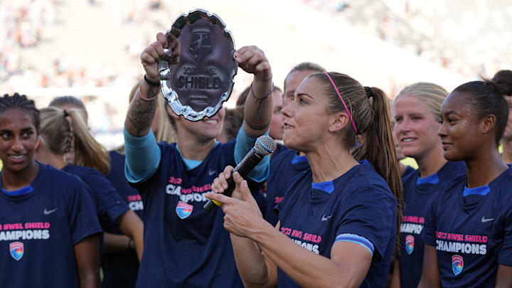 San Diego Wave FC forward Alex Morgan (13) celebrates with teammates after defeating the Racing Louisville FC and becoming the NWSL Shield Champions at Snapdragon Stadium 
