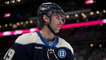 Nov 23, 2024; Columbus, Ohio, USA;  Columbus Blue Jackets center Adam Fantilli (19) awaits the face-off against the Carolina Hurricanes in the third period at Nationwide Arena. Mandatory Credit: Aaron Doster-Imagn Images
