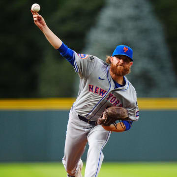 Aug 7, 2024; Denver, Colorado, USA; New York Mets starting pitcher Paul Blackburn (58) delivers a pitch in the first inning against the Colorado Rockies at Coors Field. Mandatory Credit: Ron Chenoy-USA TODAY Sports