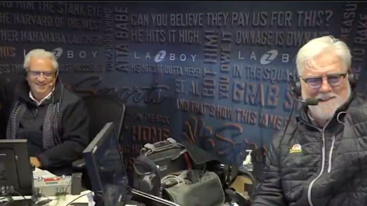 Kuiper (left) and Krukow (right) wave to Giants fans in the stands. 