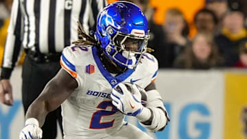 Nov 23, 2024; Laramie, Wyoming, USA; Boise State Broncos running back Ashton Jeanty (2) runs against the Wyoming Cowboys during the first quarter at Jonah Field at War Memorial Stadium. Mandatory Credit: Troy Babbitt-Imagn Images

